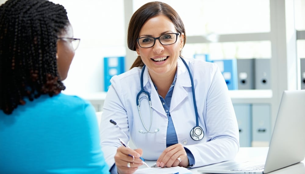 Medicare and insurance specialist consulting with a client Medicare and insurance specialist consulting with a client